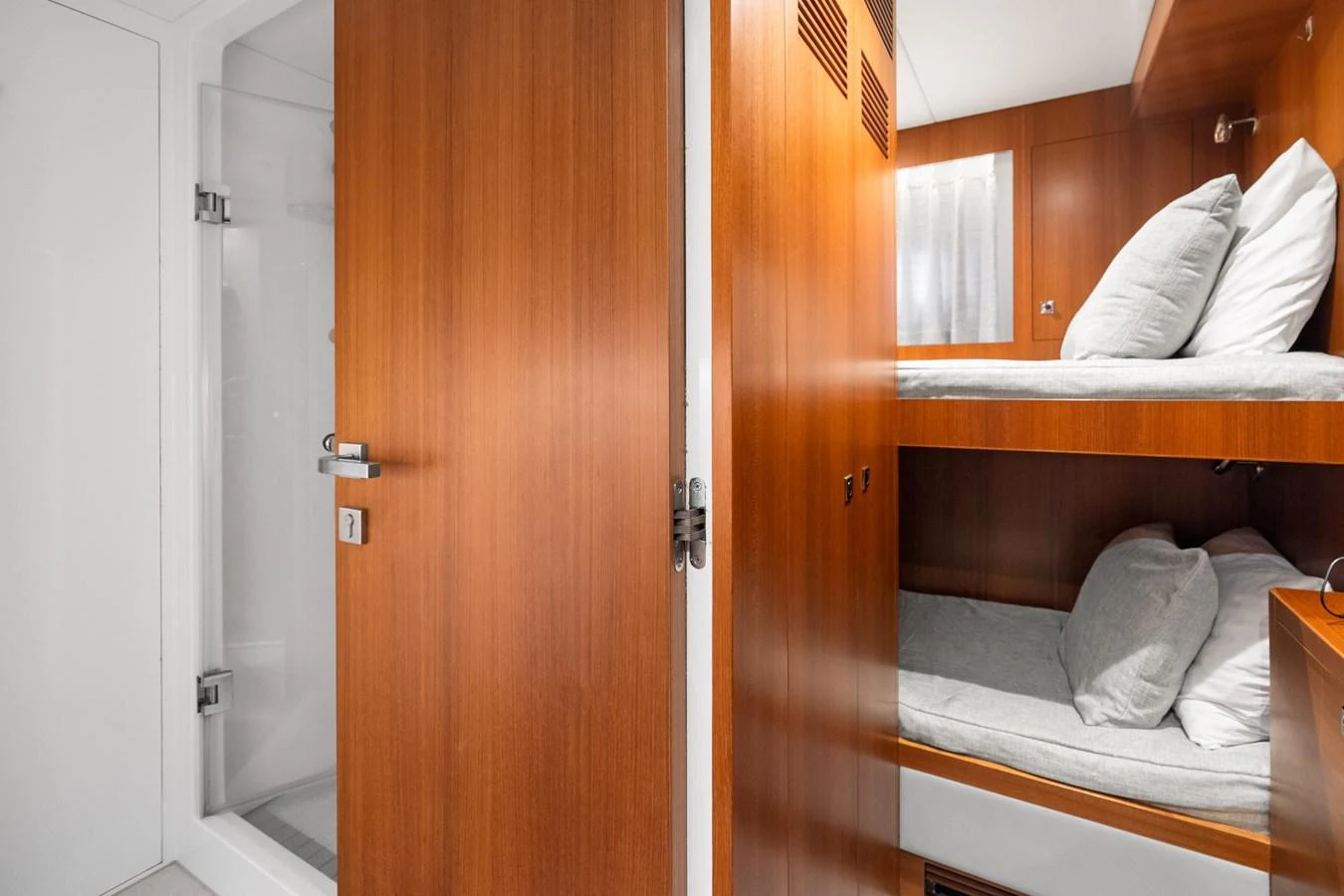 a room with a bed and a closet aboard WILD DUCK Yacht for Sale