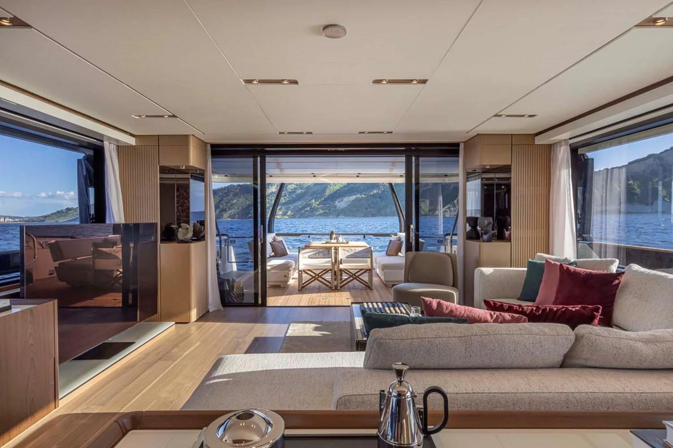 The spacious salon offers panoramic views and luxurious comfort with elegant furnishings. aboard EPIC Yacht for Sale