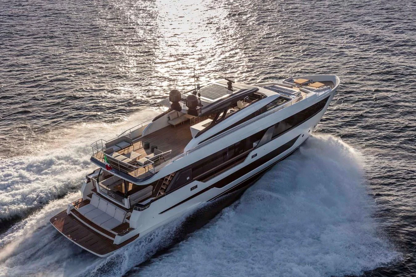 A sleek and modern yacht cruises swiftly through the water, showcasing its elegant design and spacious decks. aboard EPIC Yacht for Sale