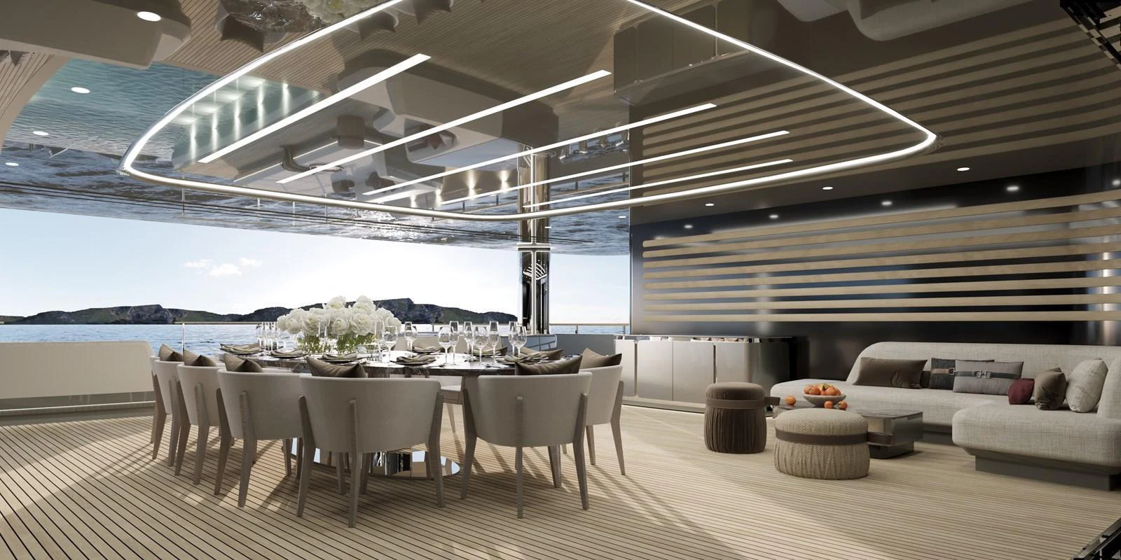 A luxurious dining area with a large table and comfortable seating, complemented by modern lighting and a scenic view. aboard 45M SUNREEF EXPLORER Yacht for Sale