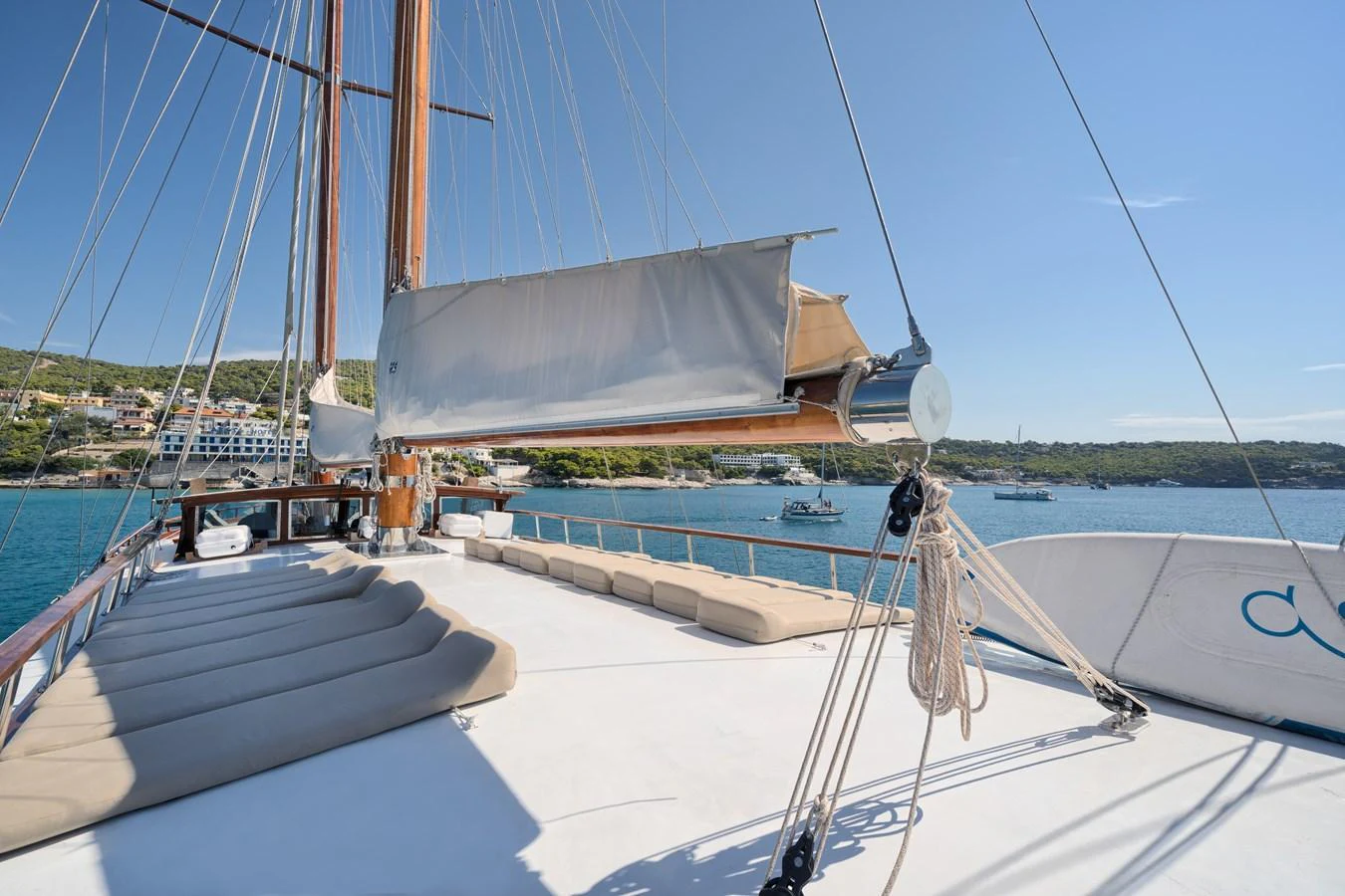 The spacious deck of this yacht offers ample seating and stunning views of the surrounding waters. aboard THALASSA Yacht for Sale