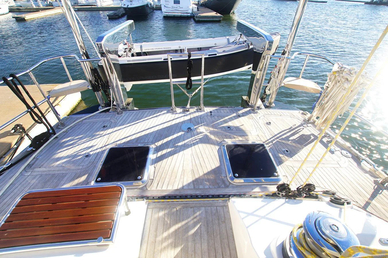 The aft deck features a spacious layout with access to the water and ample seating. aboard RAGNAR Yacht for Sale