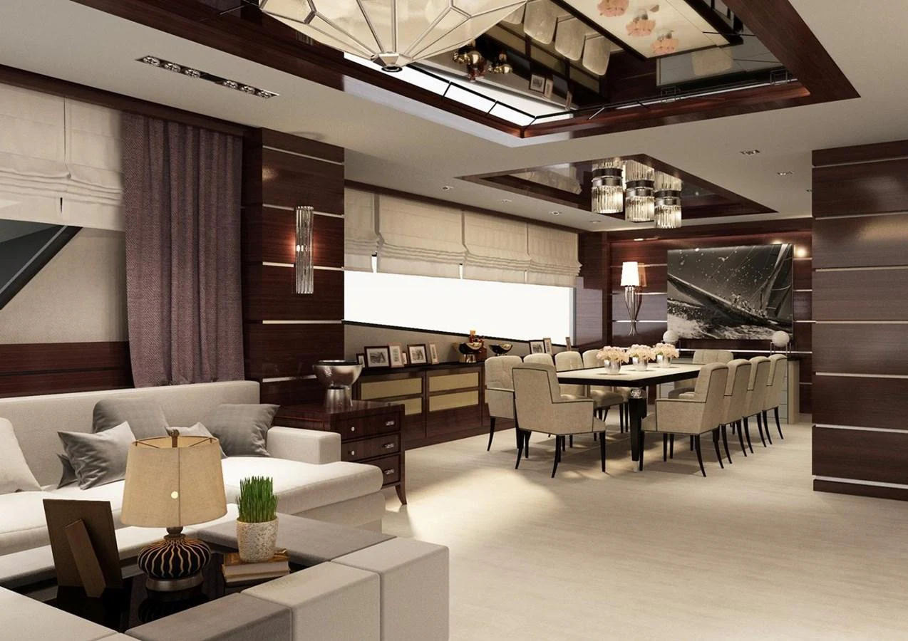 a room with a couch and a table and chairs aboard BRIZO 110 EXPLORER Yacht for Sale