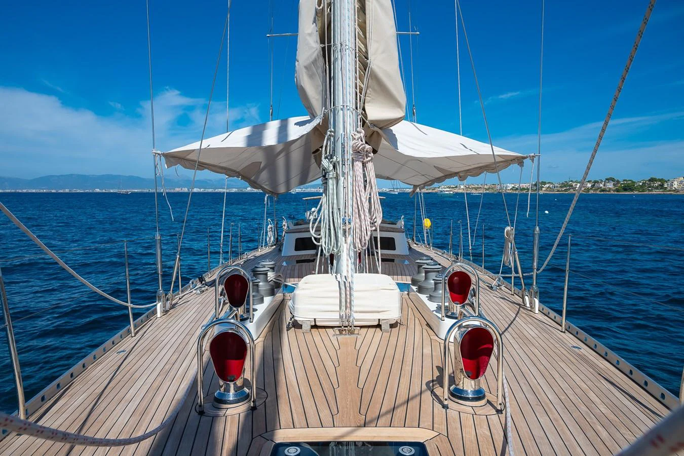 The yacht's deck offers a spacious and inviting area with a beautiful view of the sea. aboard TEMPEST Yacht for Sale