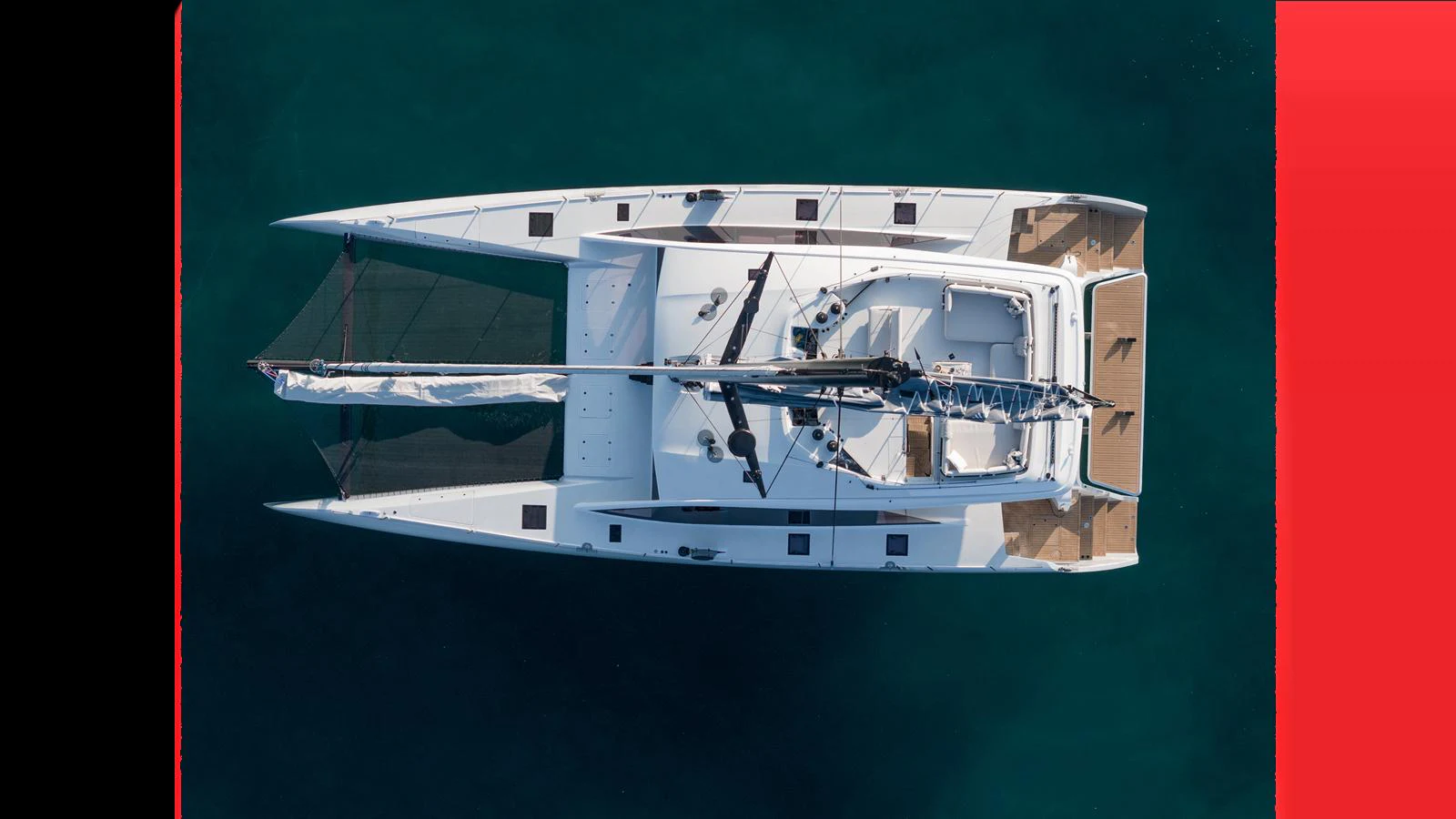 a white boat on a green background aboard GUNBOAT 72 Yacht for Sale