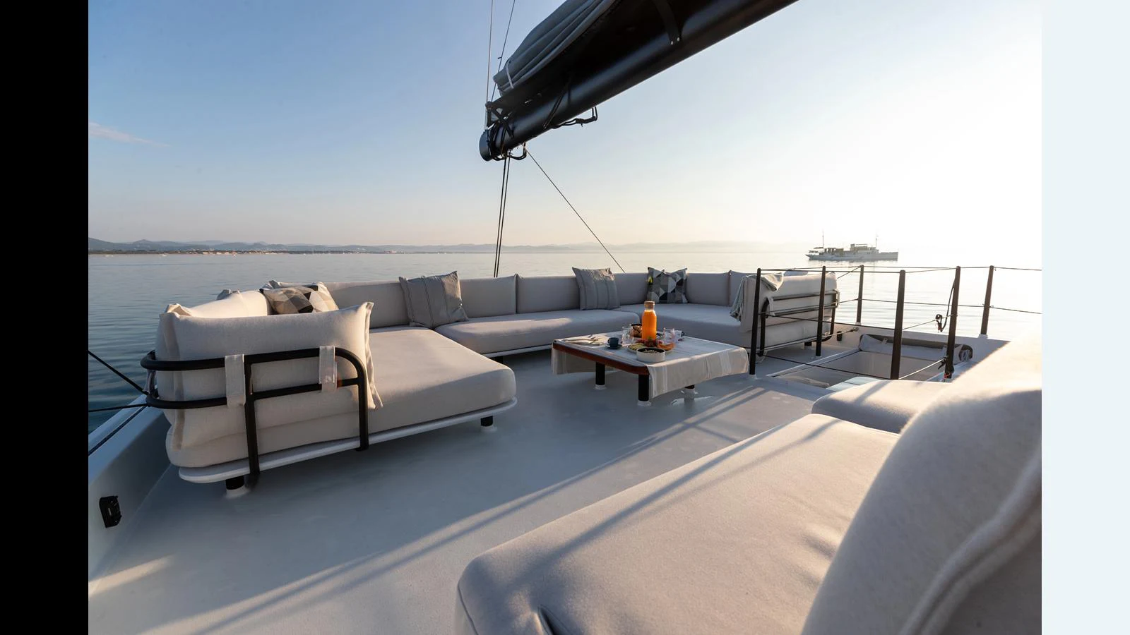 a living room with a couch and a table aboard GUNBOAT 72 Yacht for Sale