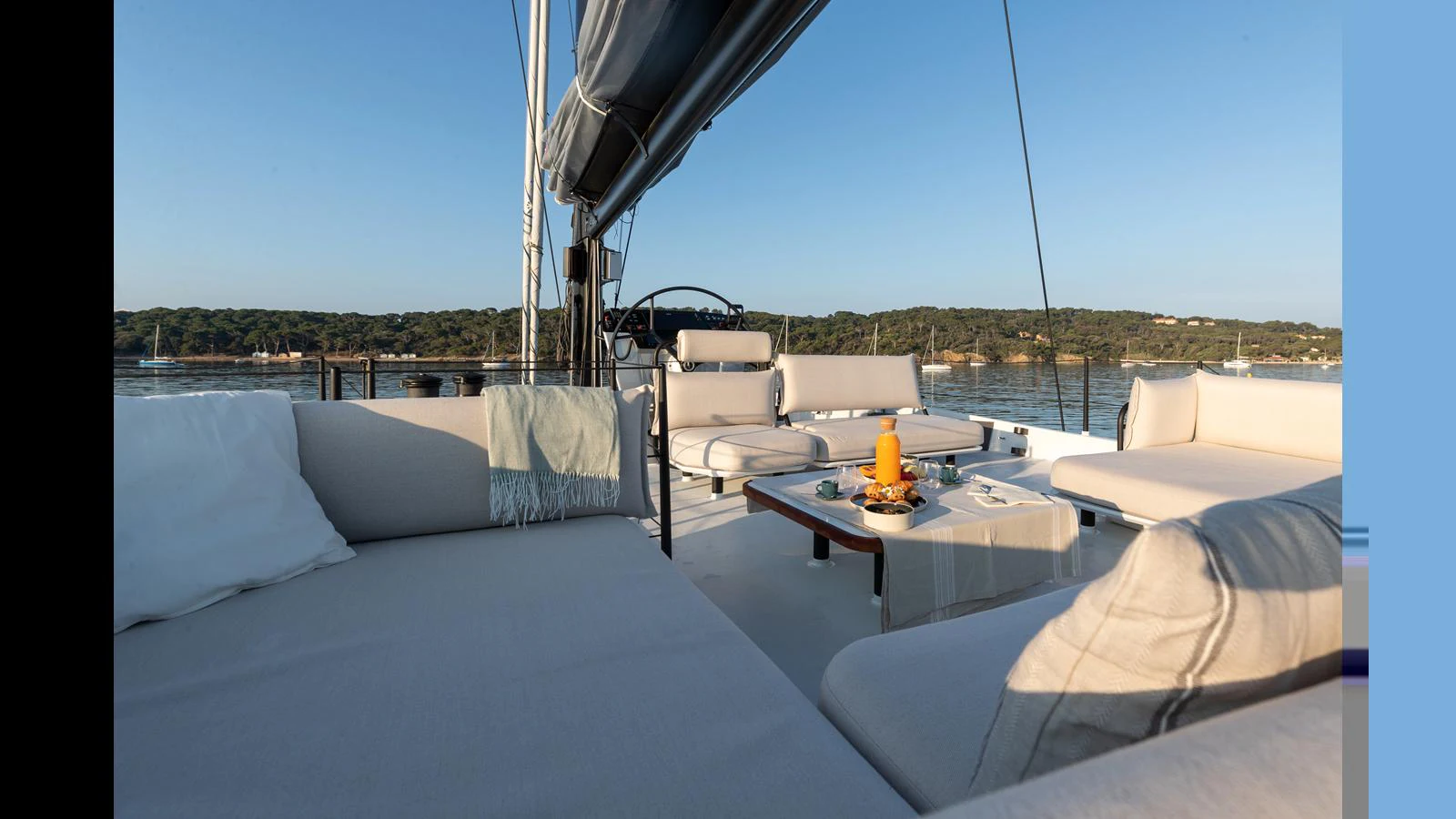 a room with a table and chairs aboard GUNBOAT 72 Yacht for Sale