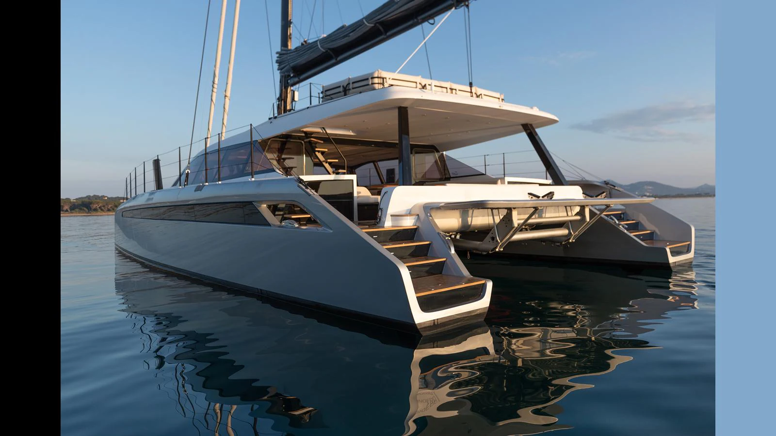 a couple of boats on the water aboard GUNBOAT 72 Yacht for Sale