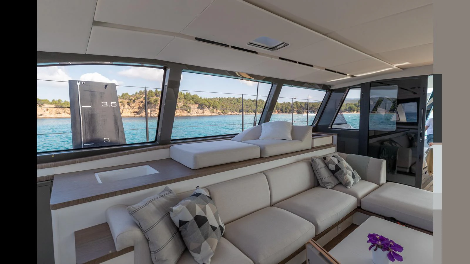 a white car with a large window aboard GUNBOAT 72 Yacht for Sale