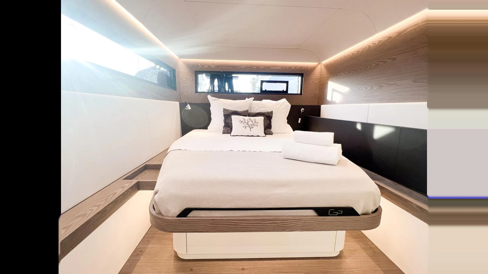 a bed in a room aboard GUNBOAT 72 Yacht for Sale