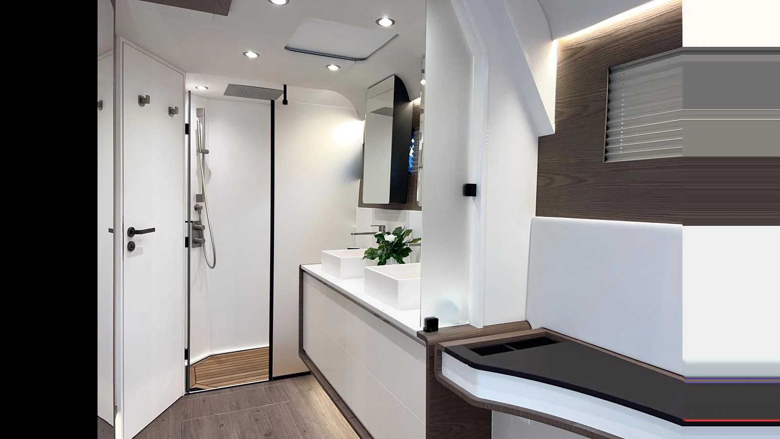 a white kitchen with white cabinets aboard GUNBOAT 72 Yacht for Sale