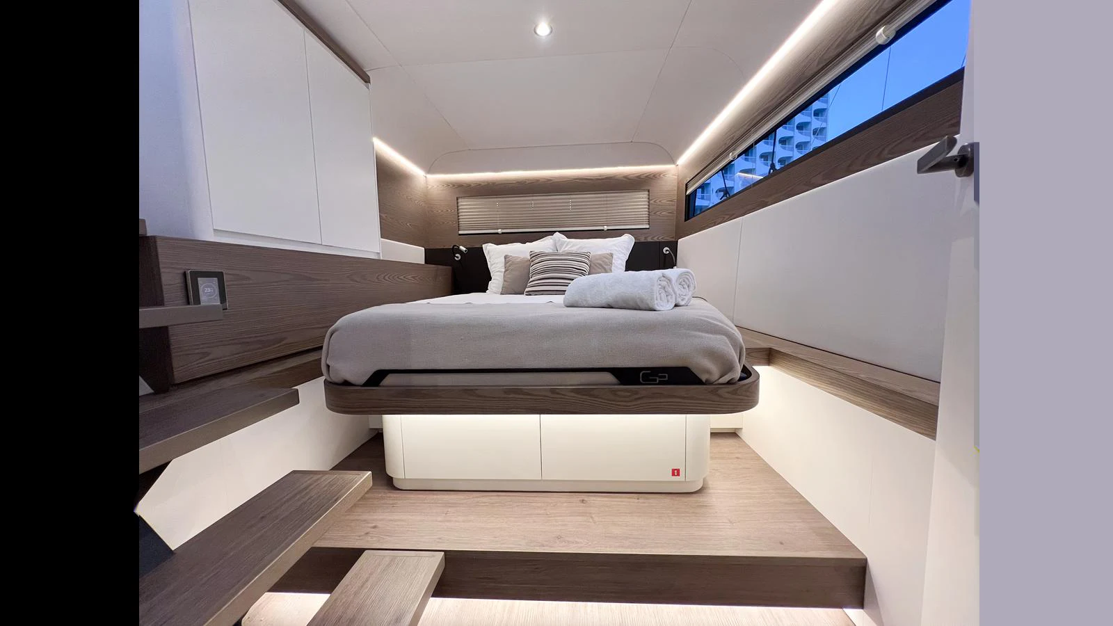 a bed in a room aboard GUNBOAT 72 Yacht for Sale