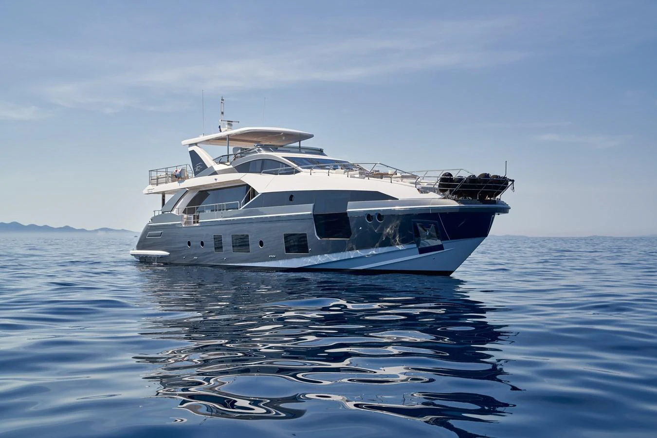 a white boat on the water aboard ALUMINIA TOO Yacht for Sale