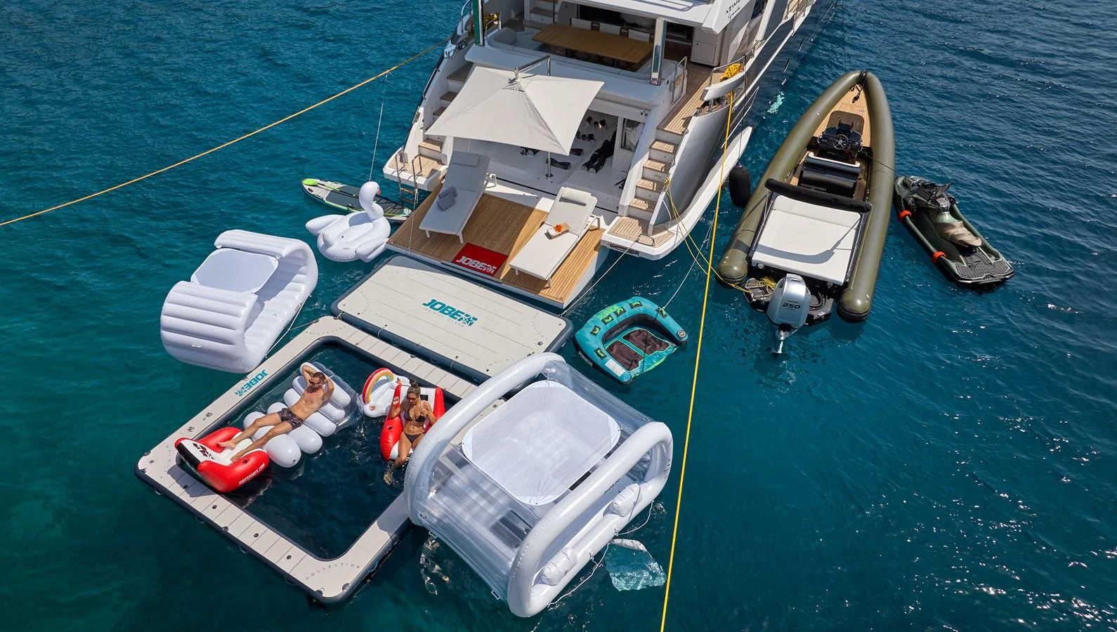 a group of boats on the water aboard ALUMINIA TOO Yacht for Sale