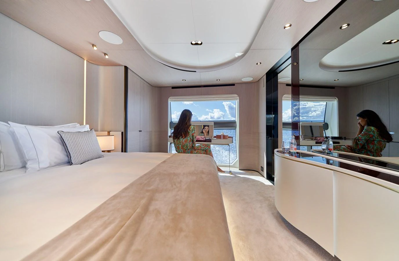 a room with a bed and a desk aboard ALUMINIA TOO Yacht for Sale