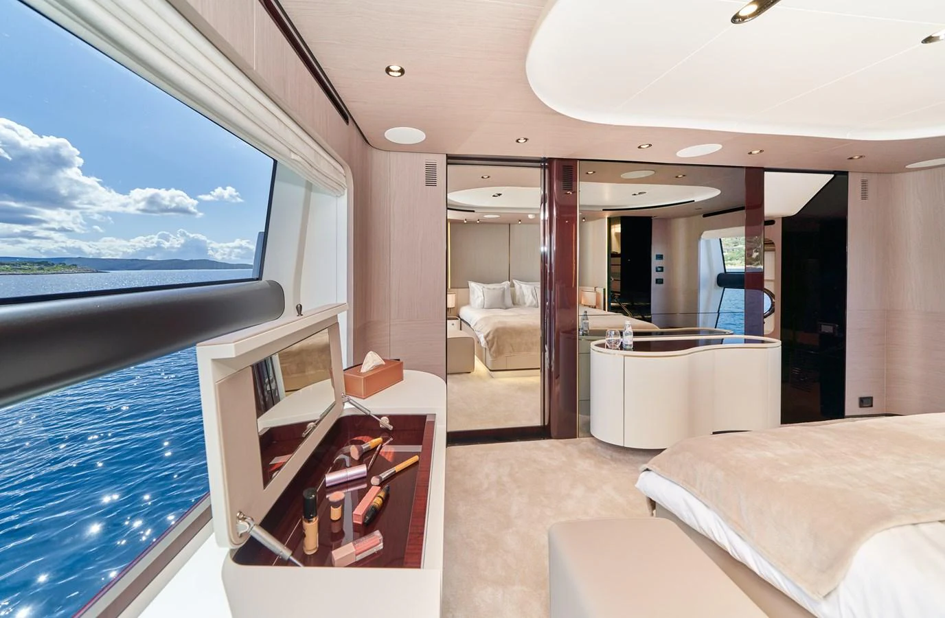 a room with a bed and a desk aboard ALUMINIA TOO Yacht for Sale