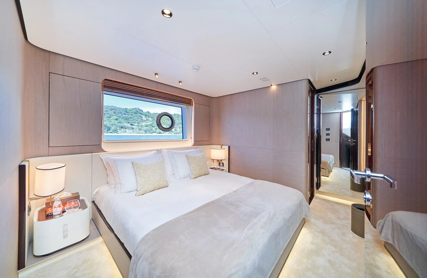 a bedroom with a bed and a sink aboard ALUMINIA TOO Yacht for Sale