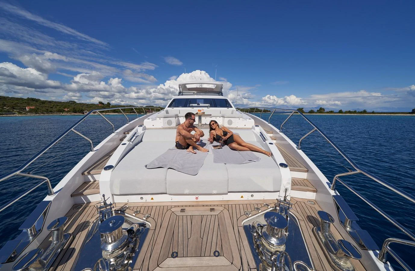 a group of people on a boat aboard ALUMINIA TOO Yacht for Sale