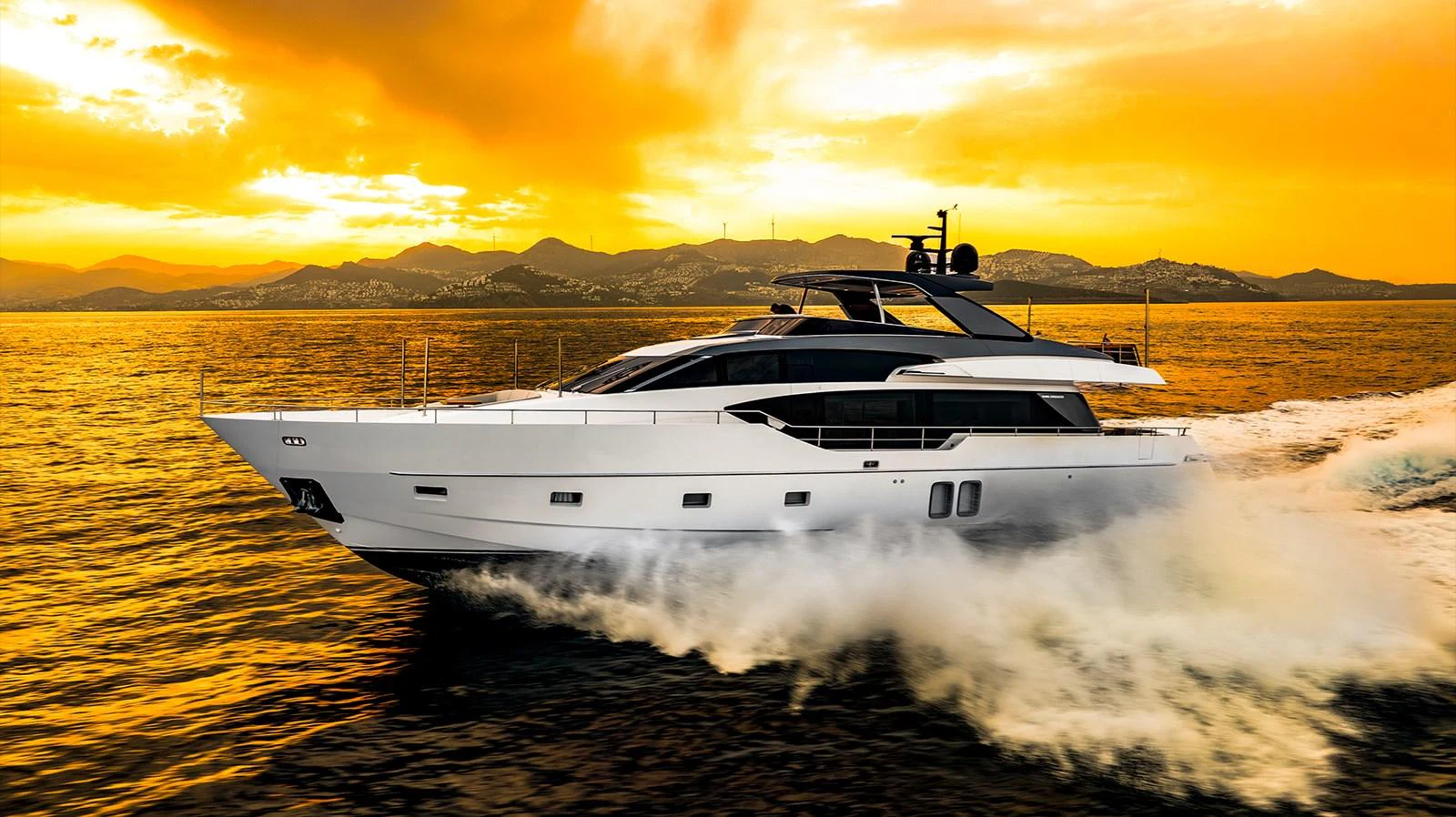 a white yacht on a beach aboard JOURNEY Yacht for Sale