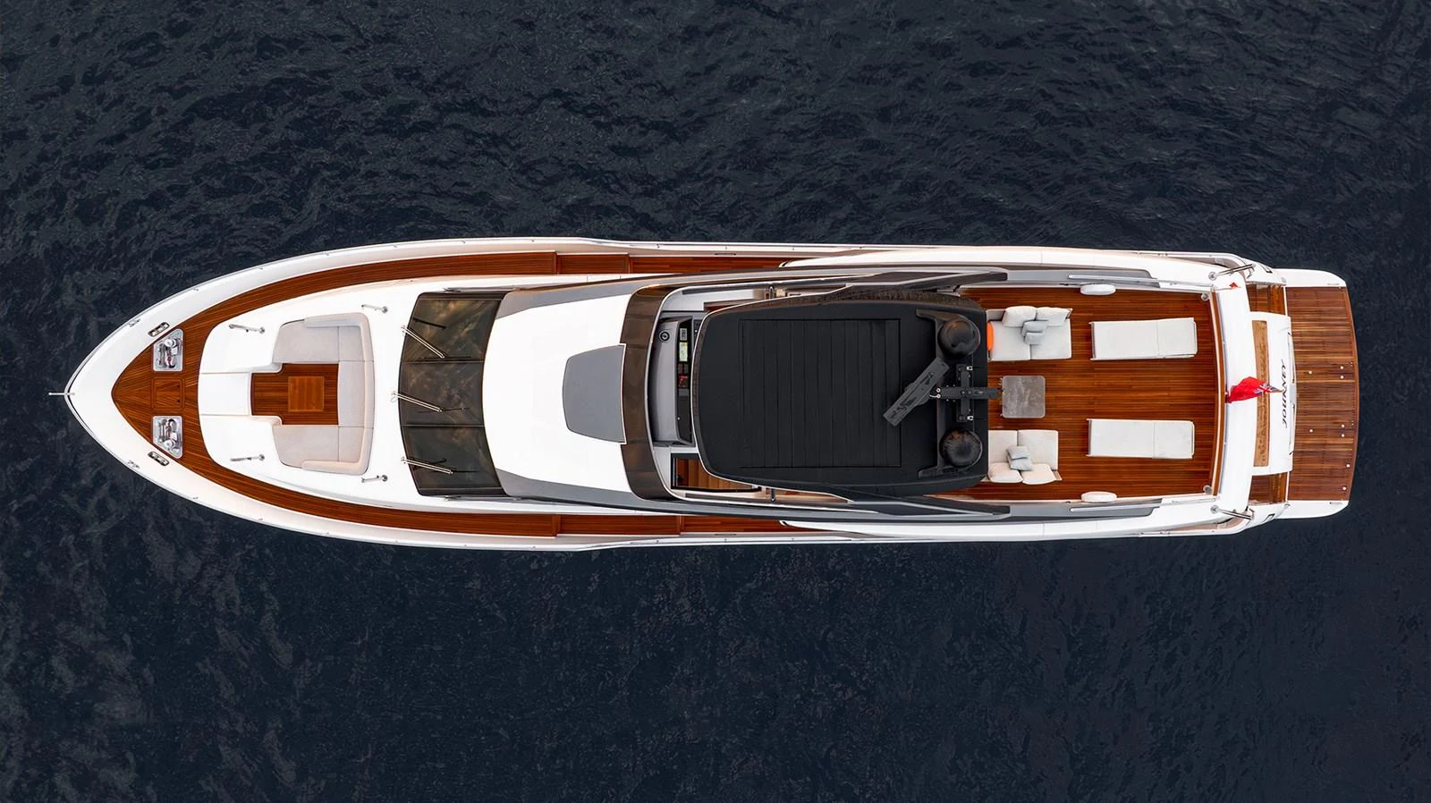 a white and orange vehicle aboard JOURNEY Yacht for Sale