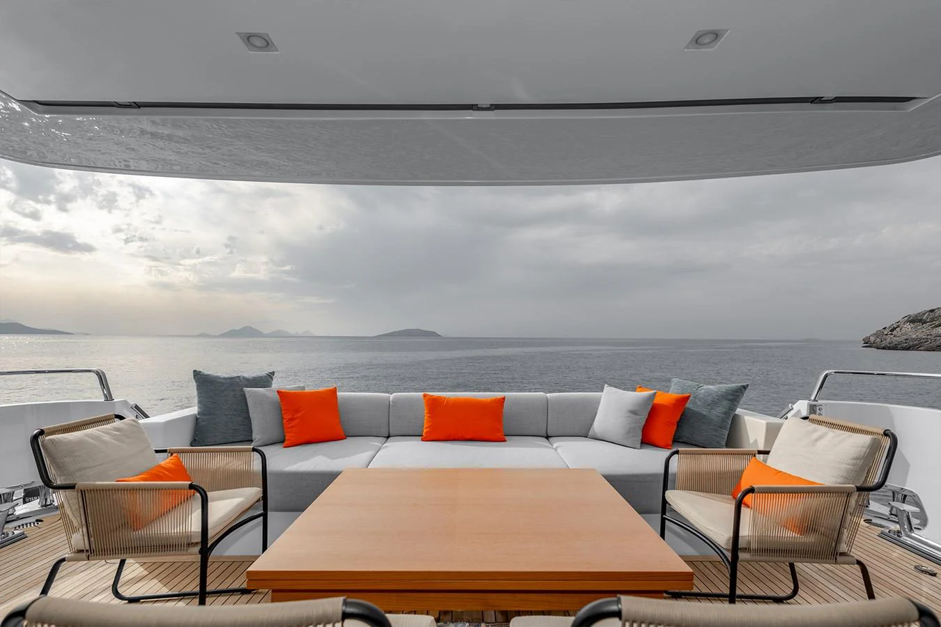 a table and chairs on a balcony aboard JOURNEY Yacht for Sale