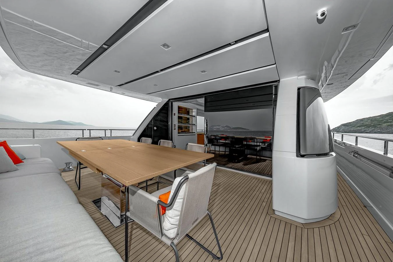 a large white tent with a table and chairs aboard JOURNEY Yacht for Sale