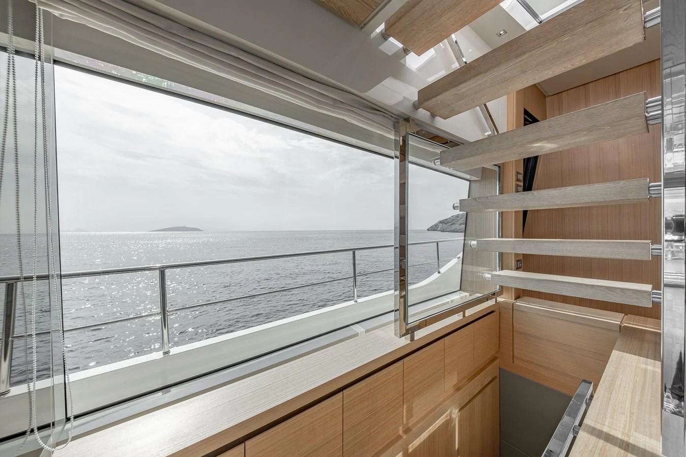 a room with a large window aboard JOURNEY Yacht for Sale