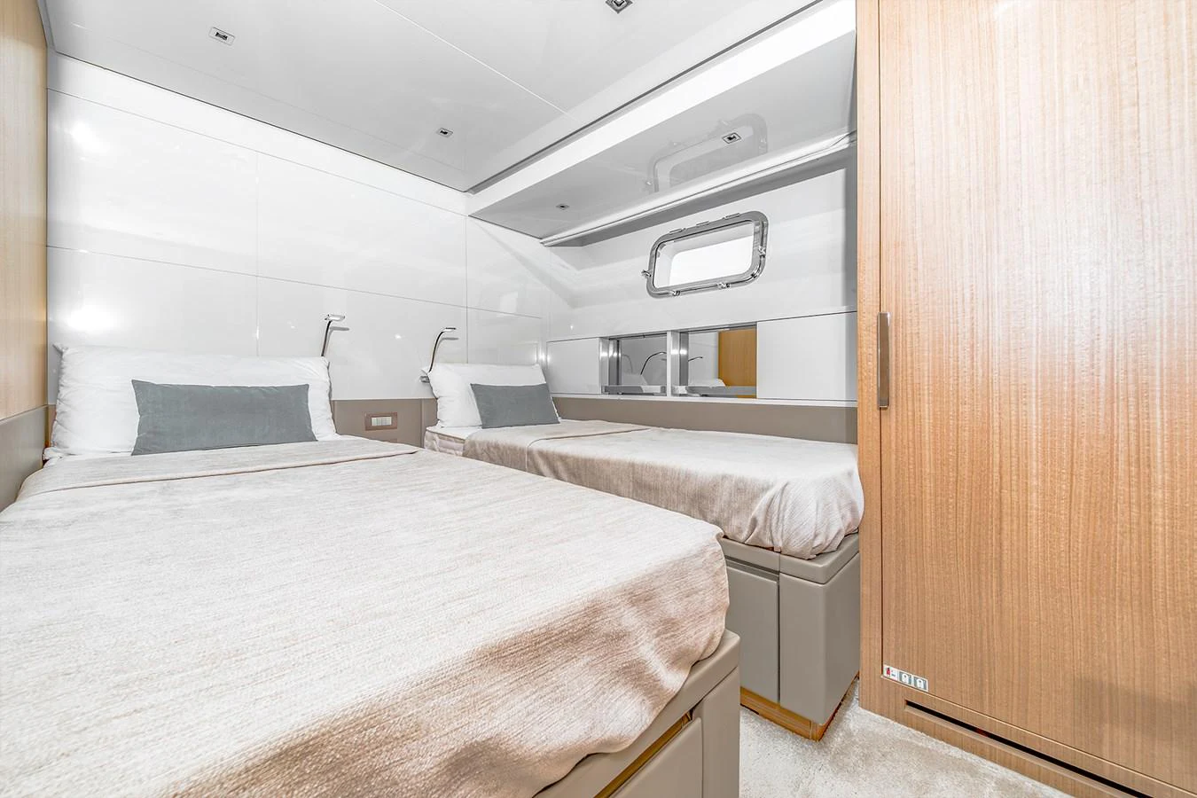 a room with two beds aboard JOURNEY Yacht for Sale