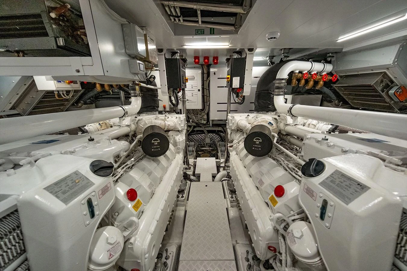 a room with several white machines aboard JOURNEY Yacht for Sale