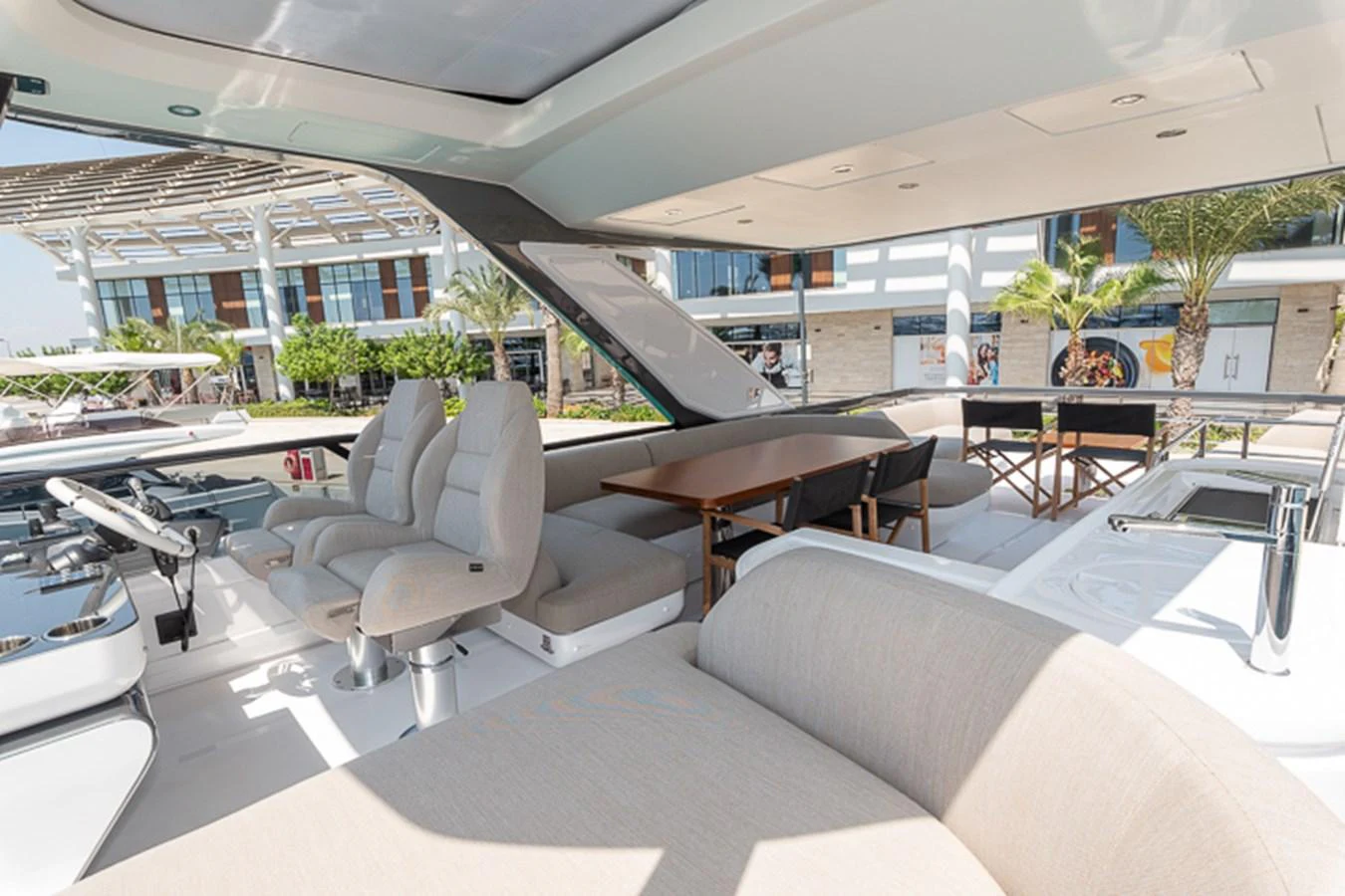 a room with a table chairs and a pool table aboard PRINCEPESSA Yacht for Sale