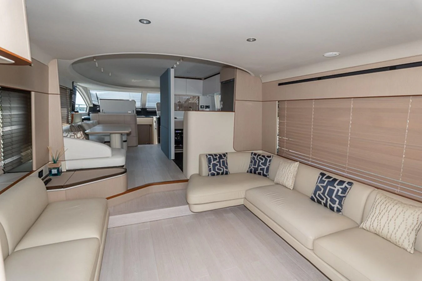 a living room with a couch and a television aboard PRINCEPESSA Yacht for Sale