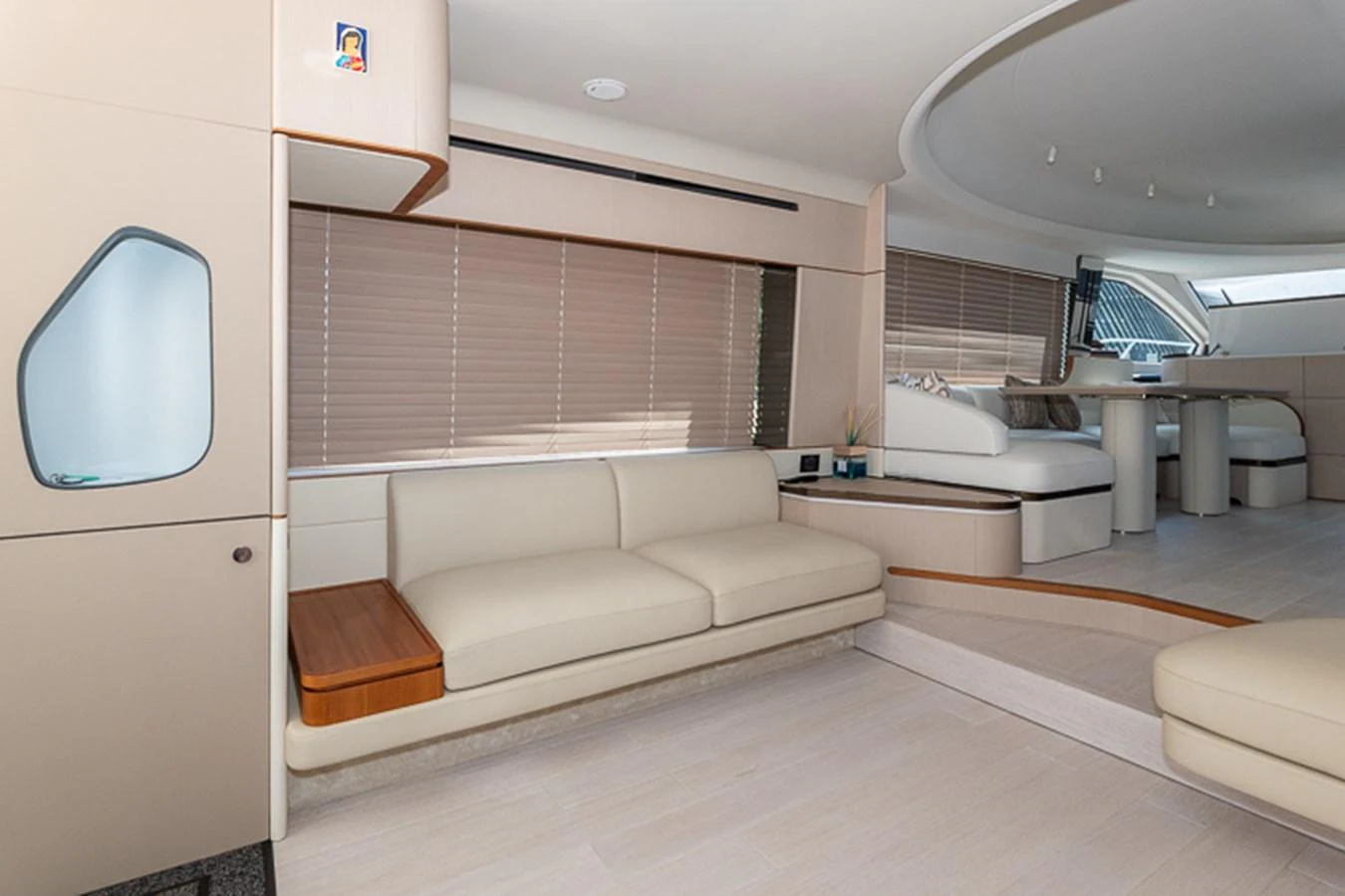 a room with a couch and a window aboard PRINCEPESSA Yacht for Sale