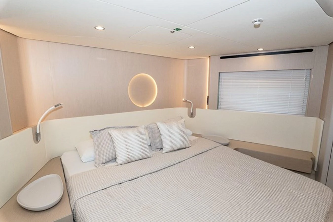 a bed with white sheets aboard PRINCEPESSA Yacht for Sale