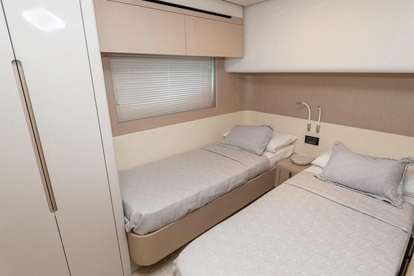 a room with two beds aboard PRINCEPESSA Yacht for Sale