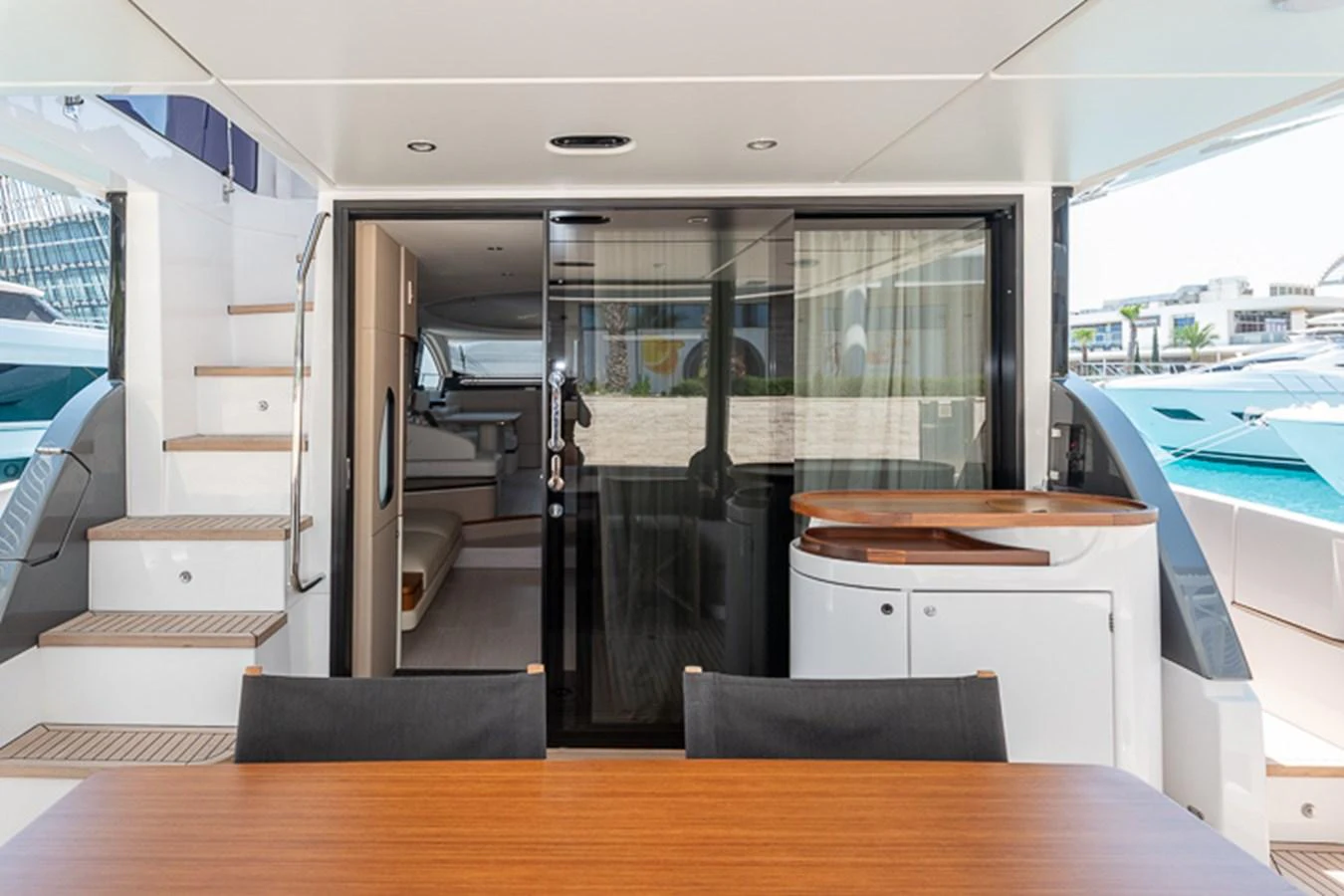a room with a table and chairs aboard PRINCEPESSA Yacht for Sale