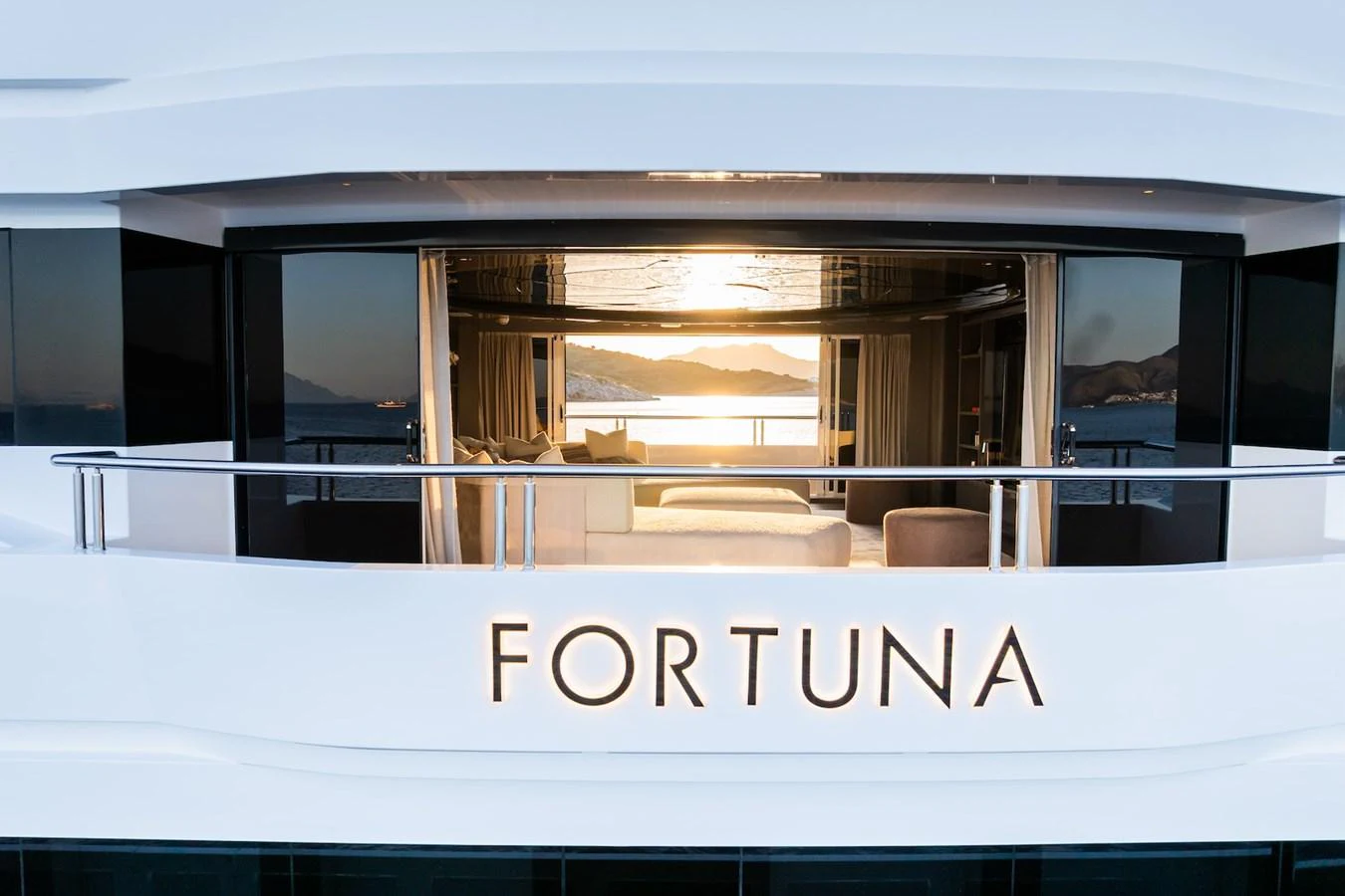 a large building with a balcony aboard FORTUNA Yacht for Sale