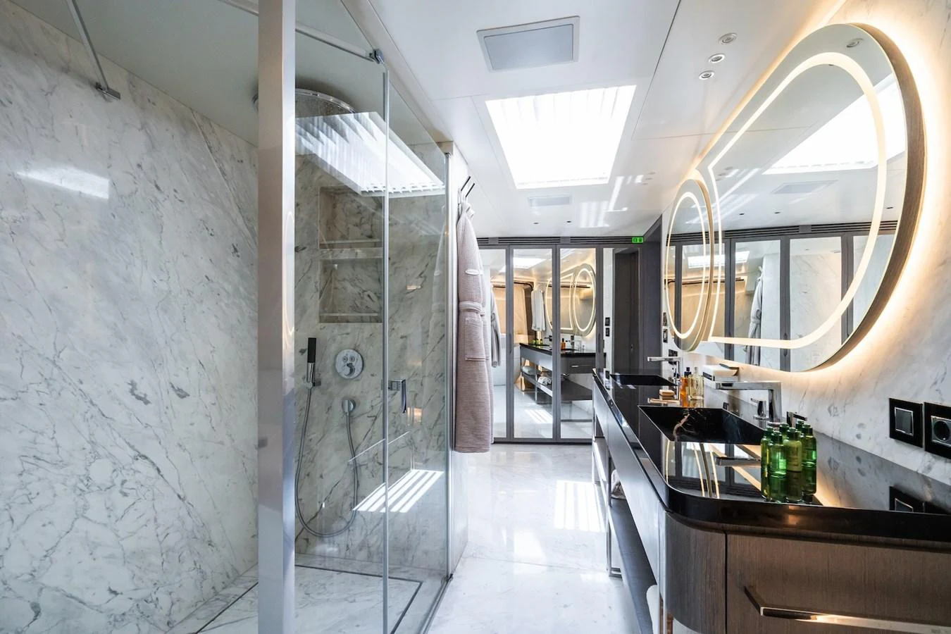 a room with a large mirror aboard FORTUNA Yacht for Sale