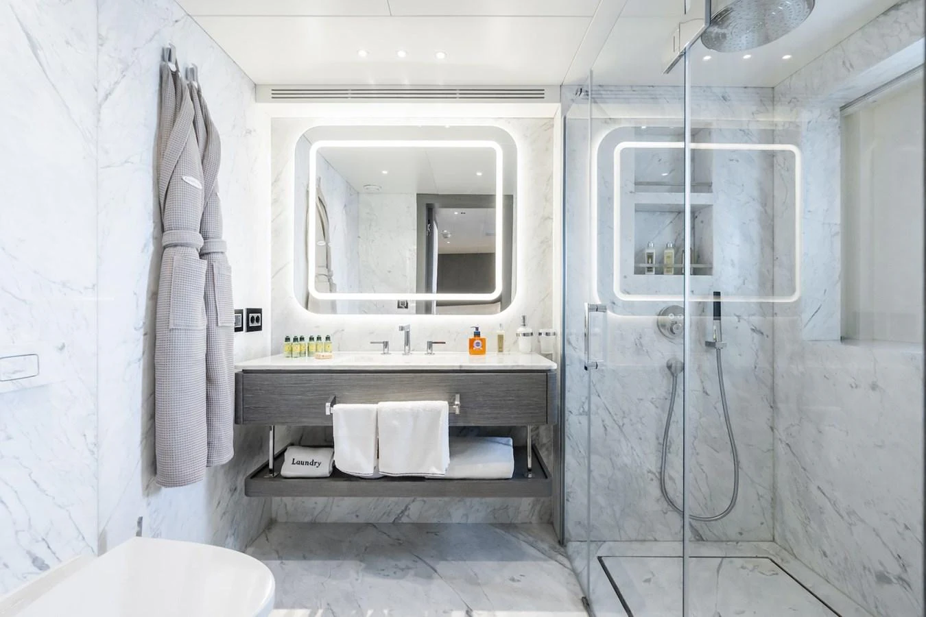 a bathroom with a sink and a mirror aboard FORTUNA Yacht for Sale