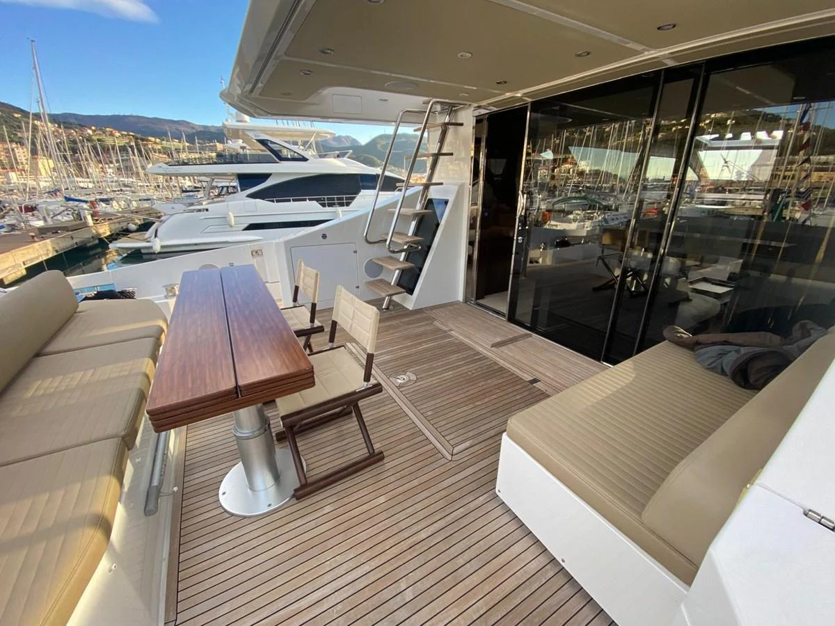 a room with a view of the water and a deck aboard 10009846 Yacht for Sale