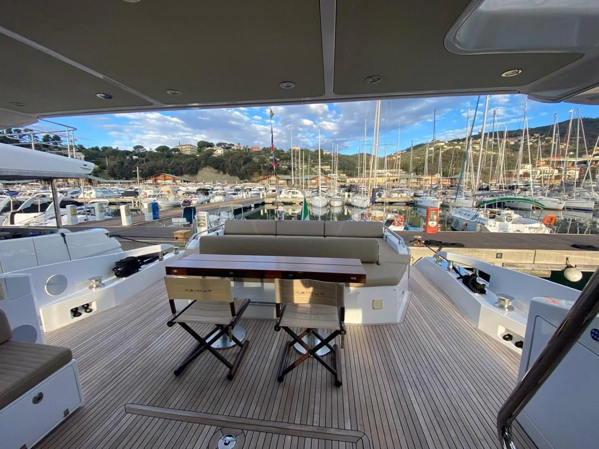 a room with tables and chairs aboard 10009846 Yacht for Sale
