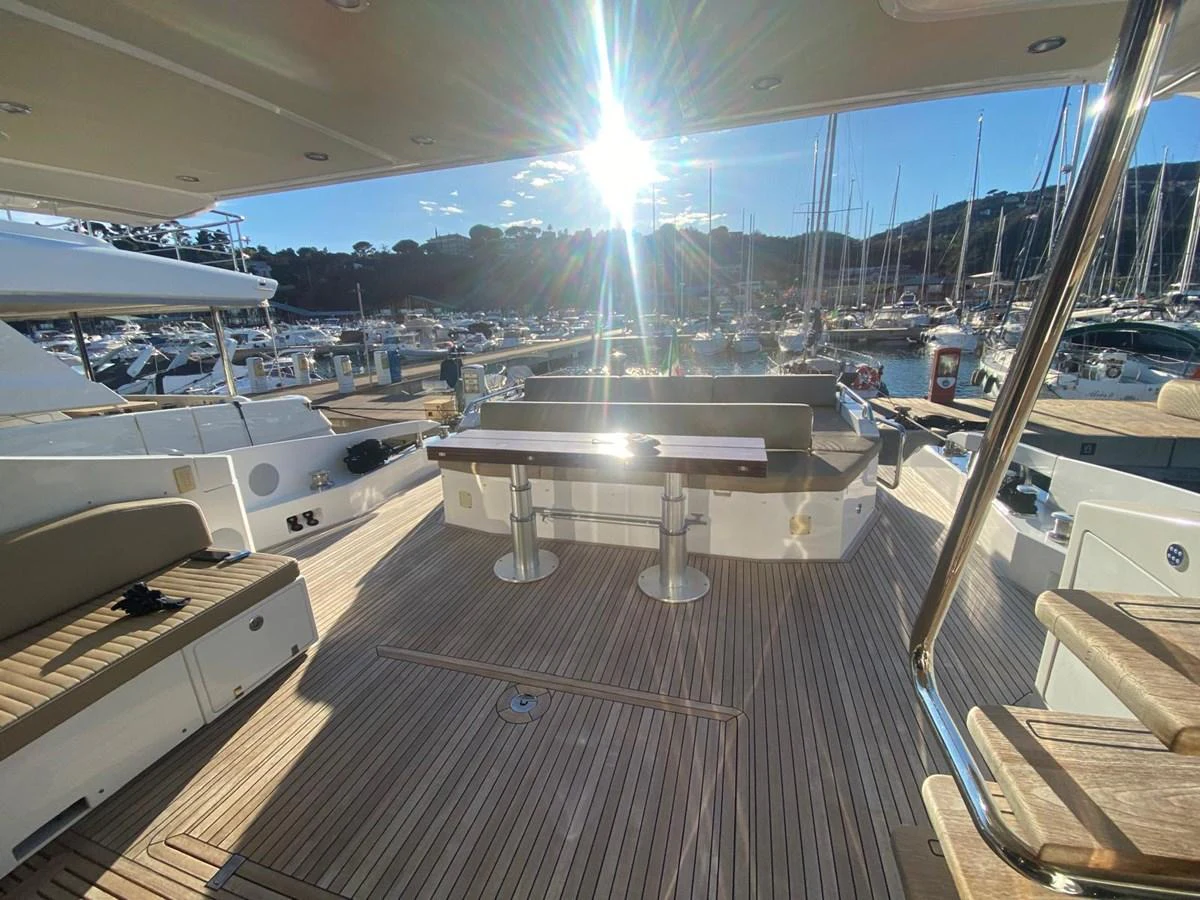 a boat dock with a view of the water and the sun aboard 10009846 Yacht for Sale
