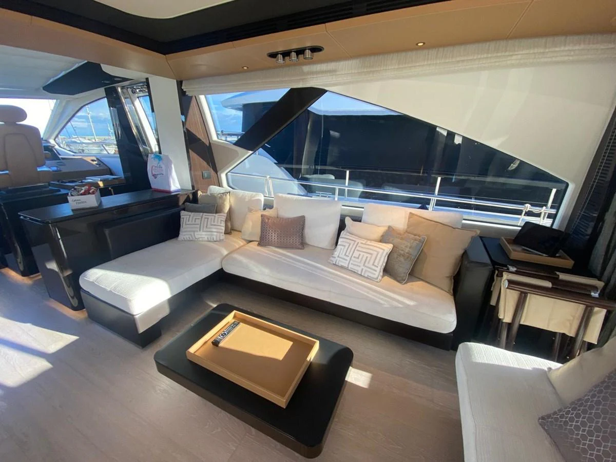 a living room with a large window aboard 10009846 Yacht for Sale