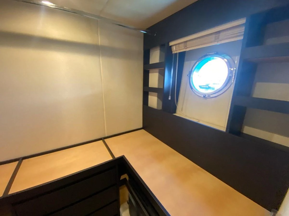 a room with a window and a door aboard 10009846 Yacht for Sale