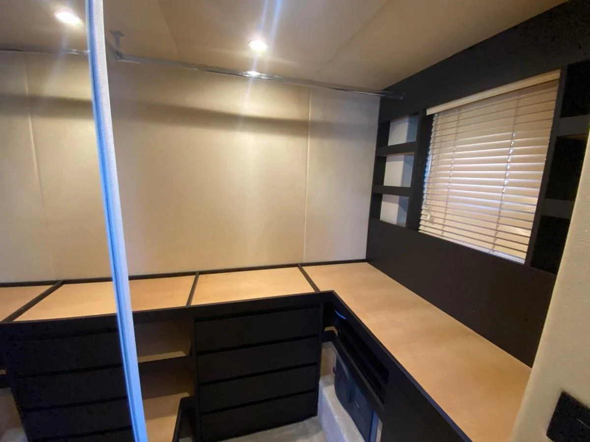 a room with a window and a shelf with a vent aboard 10009846 Yacht for Sale