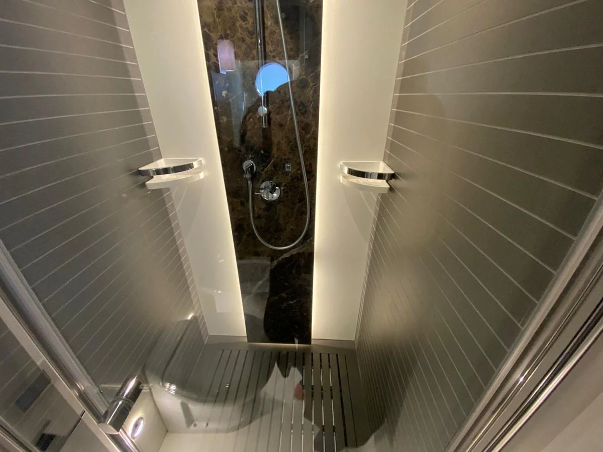 a dog looking out a window aboard 10009846 Yacht for Sale