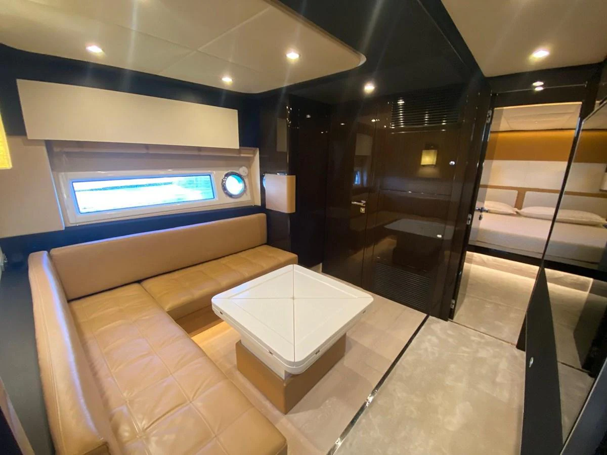 a room with a tv and a couch aboard 10009846 Yacht for Sale