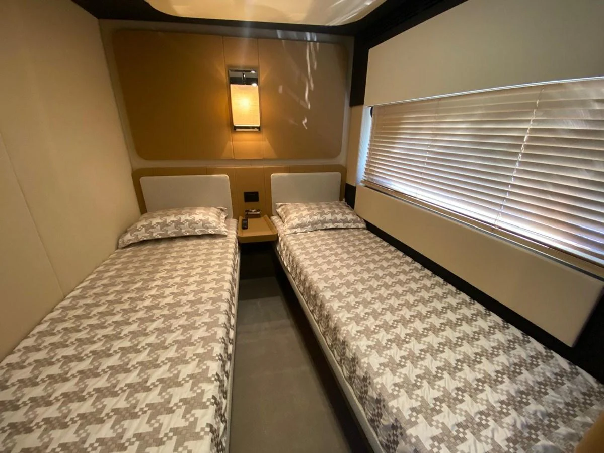 a couple of beds in a room aboard 10009846 Yacht for Sale