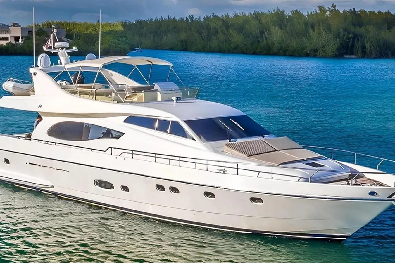 a white yacht on the water aboard HINXXLVI02 Yacht for Sale
