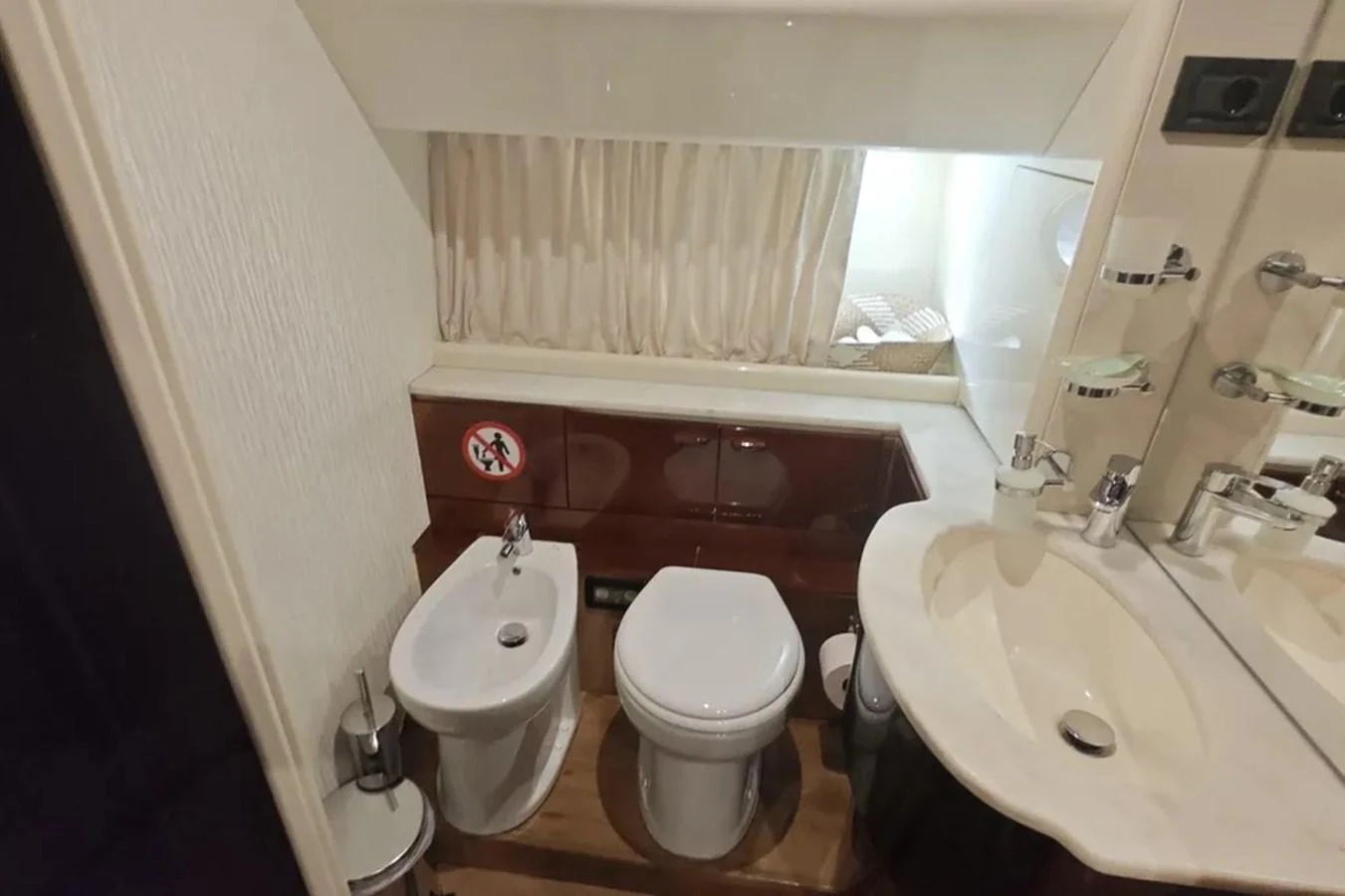a bathroom with a toilet sink and a bathtub aboard HINXXLVI02 Yacht for Sale