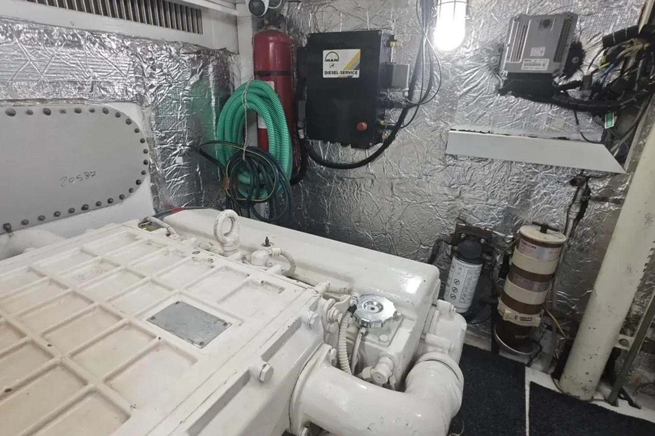a white sink with a faucet and a black coffee maker aboard HINXXLVI02 Yacht for Sale